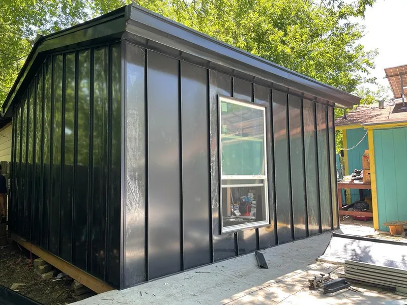 Black standing seam metal wall panels for Roof Inspection in Garden Home-Whitford